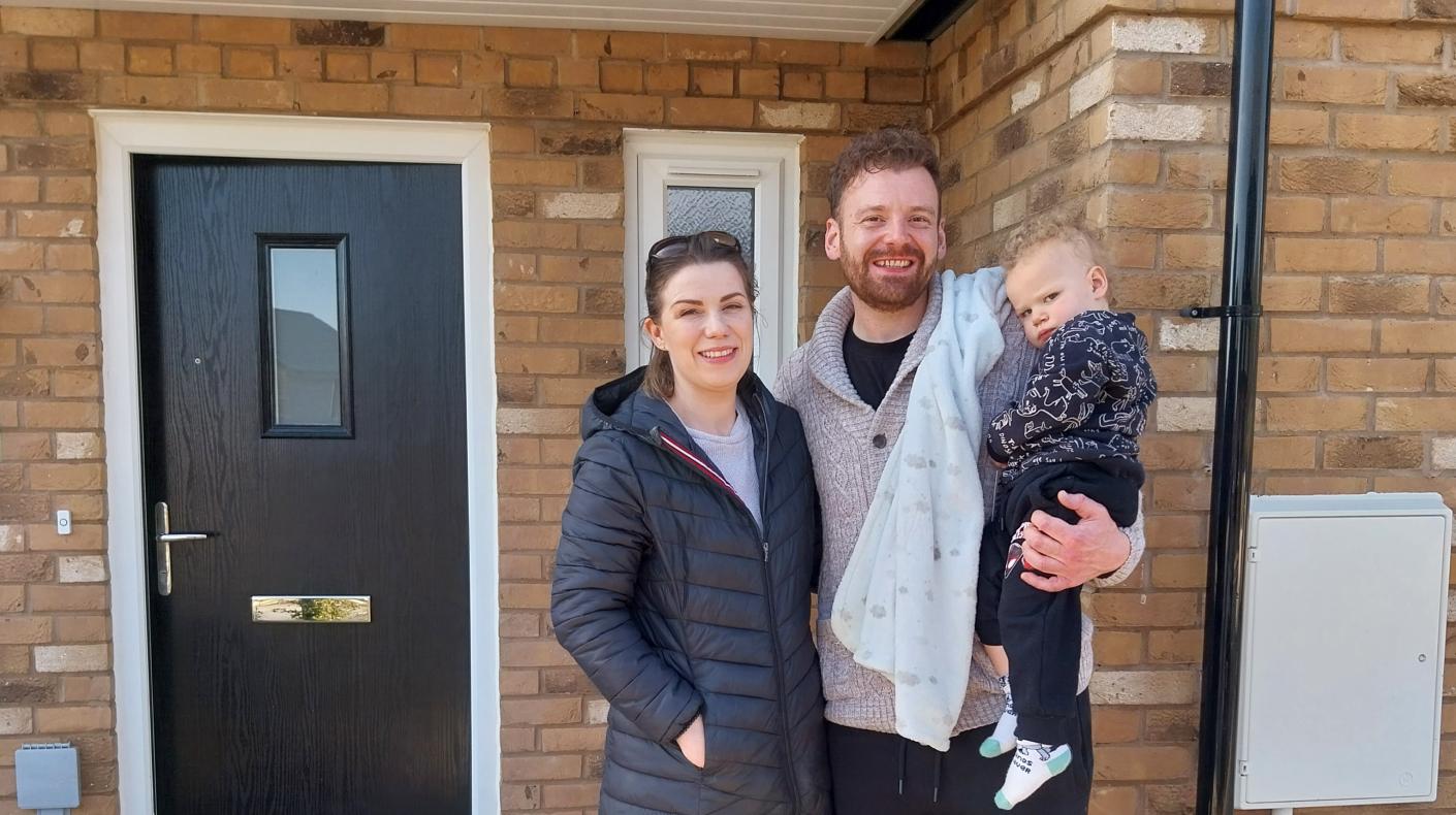 A family moving in to their new home