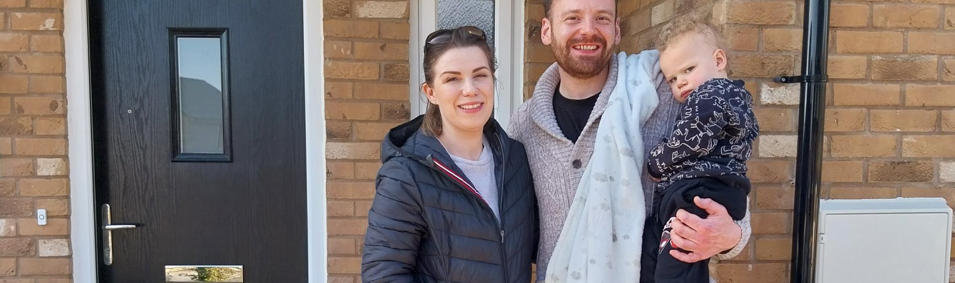 A family moving in to their new home