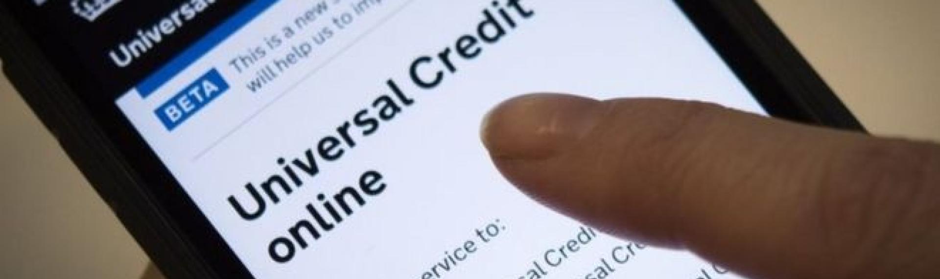A mobile smart phone on the universal credit home page