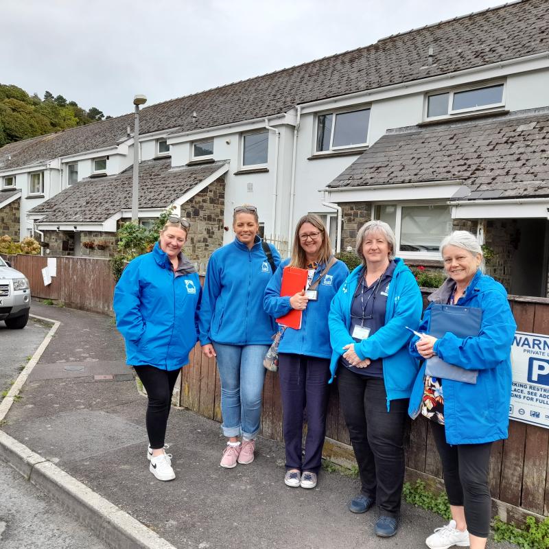 Local Conversation Lynton; staff outside homes
